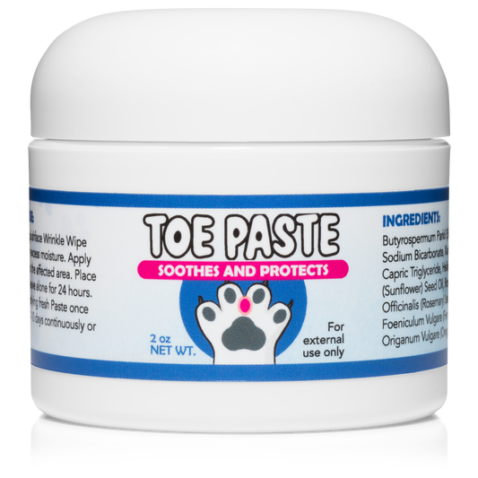 Jar of toe paste for pets with a white background