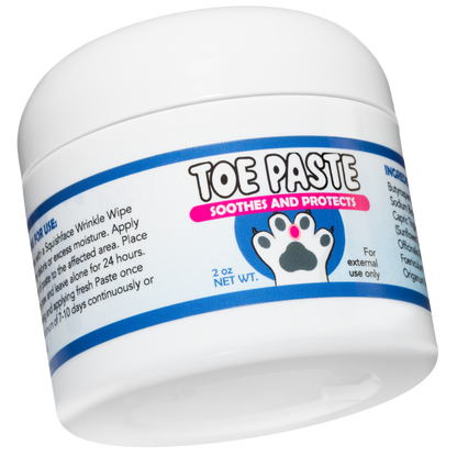 Jar of toe paste for dogs with a white background